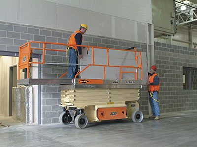 JLG Scissor Lift in Construction Site
